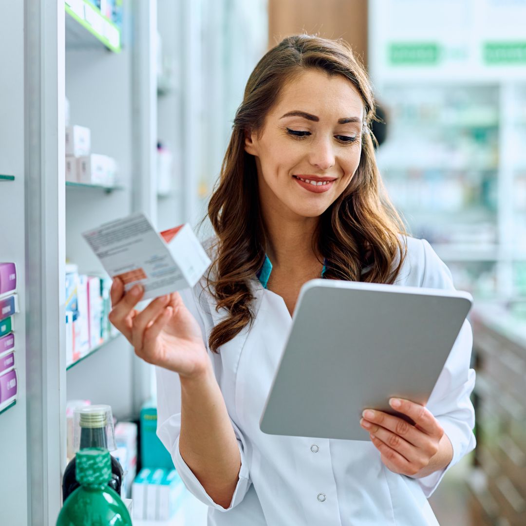 Pharmacist looking at a tablet